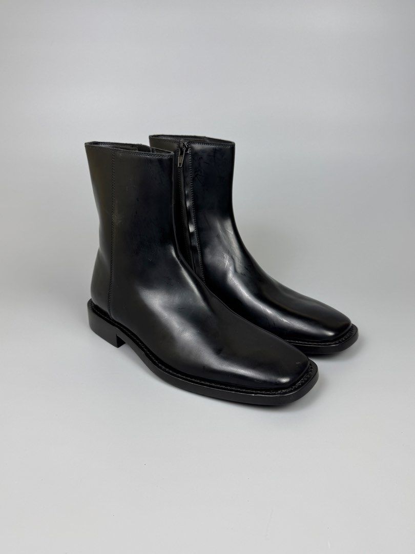 Balenciaga - Chelsea Leather Square Toe Boots (Category: Sneakers & Footwear) located in Quezon City. Submitted by japon_rose (Listing ID 1461833066, Image 1). Description: READ DESCRIPTION FIRST BEFORE YOU START A DEAL Please do self authenticate all photos are been posted Balenciaga - Chelsea Leather Square Toe Boots Color: Black Size: 38.5 on tag (Unisex) Insole: 27.5cm Outsole: 28.5cm Height: 18cm Heels: 2.5cm Mens: 6.5-7 US Womens: 8.5-9 US 