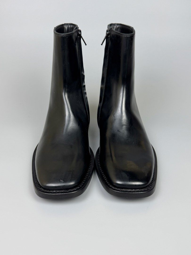 Balenciaga - Chelsea Leather Square Toe Boots (Category: Sneakers & Footwear) located in Quezon City. Submitted by japon_rose (Listing ID 1461833066, Image 3). Description: READ DESCRIPTION FIRST BEFORE YOU START A DEAL Please do self authenticate all photos are been posted Balenciaga - Chelsea Leather Square Toe Boots Color: Black Size: 38.5 on tag (Unisex) Insole: 27.5cm Outsole: 28.5cm Height: 18cm Heels: 2.5cm Mens: 6.5-7 US Womens: 8.5-9 US 