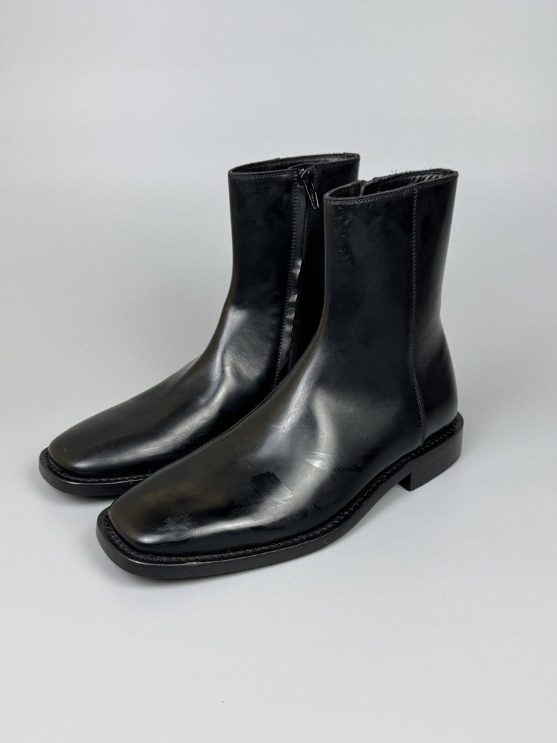 Balenciaga - Chelsea Leather Square Toe Boots (Category: Sneakers & Footwear) located in Quezon City. Submitted by japon_rose (Listing ID 1461833066, Image 2). Description: READ DESCRIPTION FIRST BEFORE YOU START A DEAL Please do self authenticate all photos are been posted Balenciaga - Chelsea Leather Square Toe Boots Color: Black Size: 38.5 on tag (Unisex) Insole: 27.5cm Outsole: 28.5cm Height: 18cm Heels: 2.5cm Mens: 6.5-7 US Womens: 8.5-9 US 