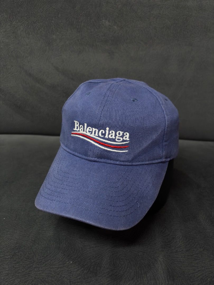 Balenciaga Archetype Since All Winter 17 Cap Navy Blue (Category: Caps & Hats) located in Antipas. Submitted by charsonaesthetics (Listing ID 1461969342, Image 1). Description: - Balenciaga Archetype Cap - From the All Winter 17 Collection - Color: Navy Blue - Features embroidered logo - Material: 100% Cotton - Made in China - Ideal for everyday wear.