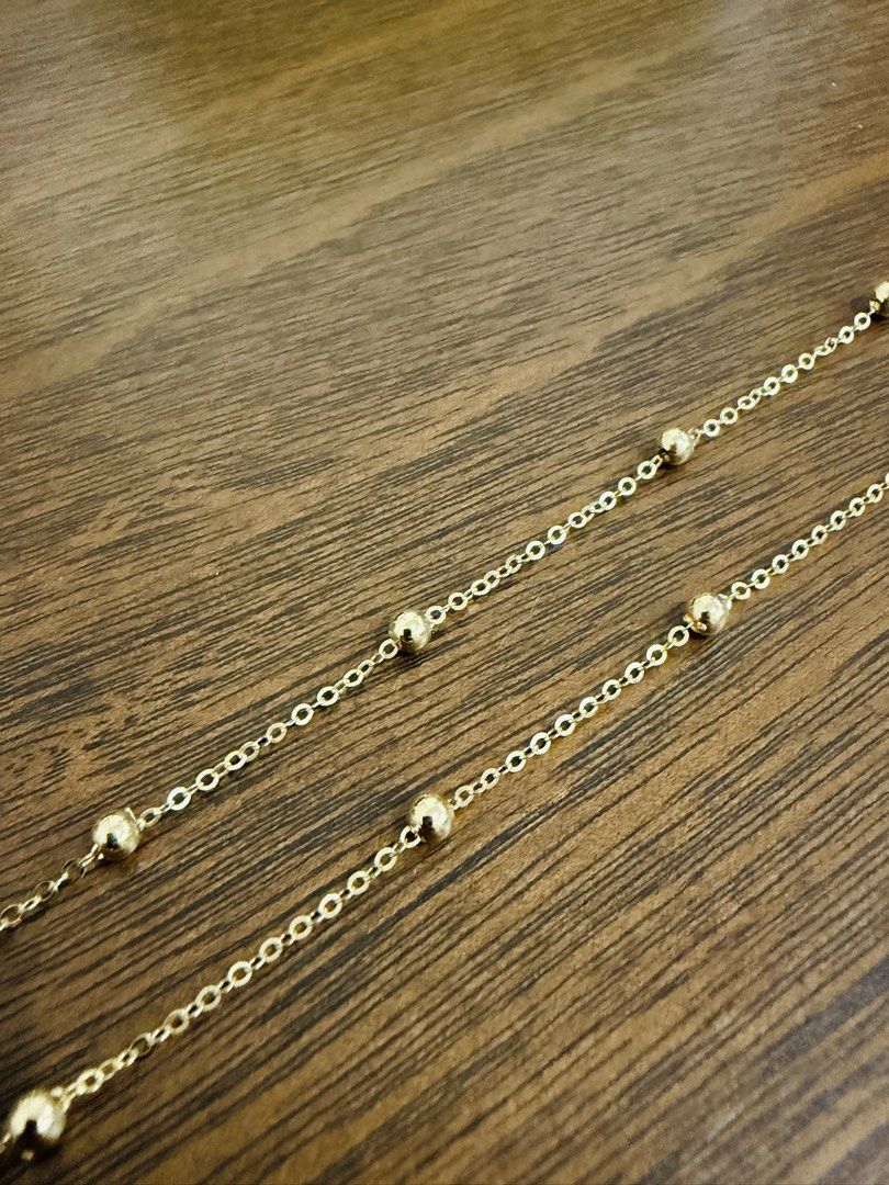 Ball station necklace (Category: Necklaces) located in Manila. Submitted by abibantaya24257 (Listing ID 1461874740, Image 2). Description: - 16 inches / 1.1 grams - Delicate gold chain necklace - Features small, spaced gold beads - Has a beautiful shine - Secure clasp closure - Ideal for layering or wearing solo - Simple and classic design.