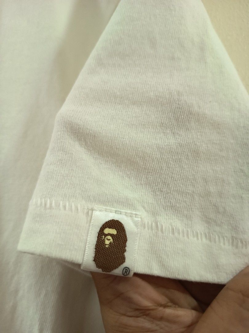 Bape Big Logo (Category: Tshirts & Polo Shirts ) located in Manila. Submitted by skippypeanut1331 (Listing ID 1461960508, Image 3). Description: 21x29 Large Good condition Color rate: 9/10 issue: pinhole, need wash.