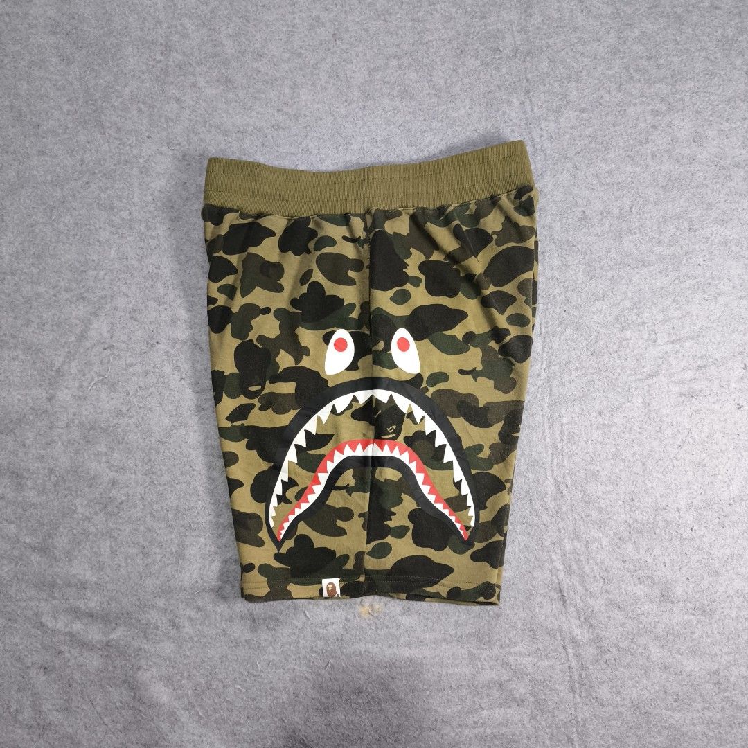 Bape Shark Camouflage Sweat Short (Category: Activewear) located in Manila. Submitted by shykes_26 (Listing ID 1461939069, Image 1). Description: Dimensions: Waist - 32-36 Length - 21 Leg open - 13 Issues: None.