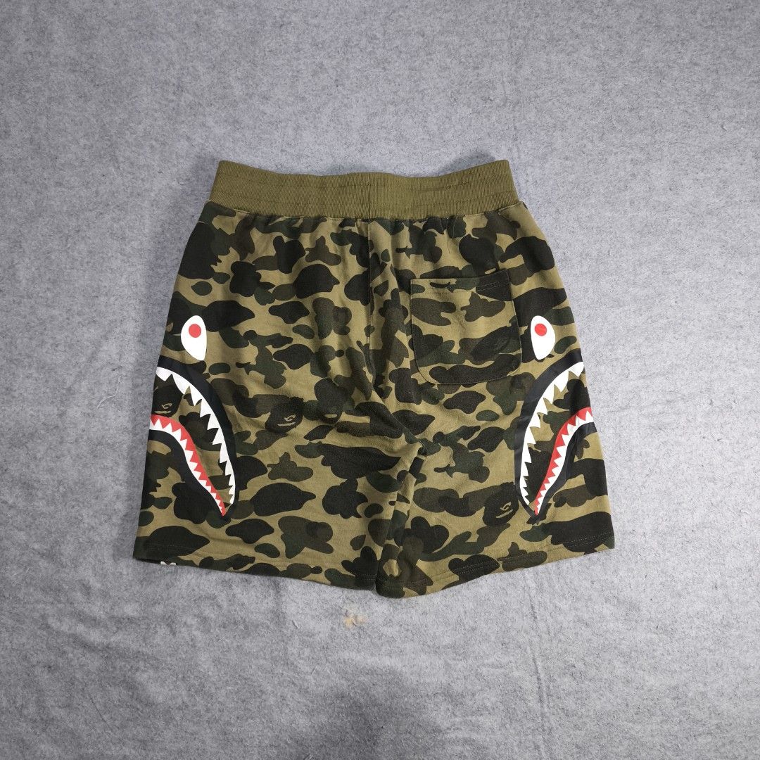 Bape Shark Camouflage Sweat Short (Category: Activewear) located in Manila. Submitted by shykes_26 (Listing ID 1461939069, Image 3). Description: Dimensions: Waist - 32-36 Length - 21 Leg open - 13 Issues: None.