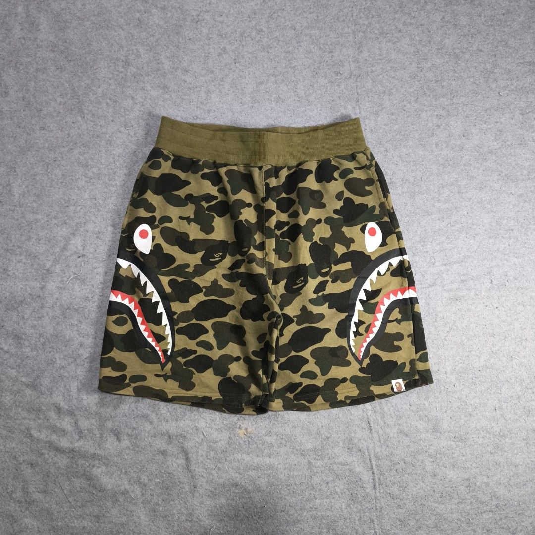 Bape Shark Camouflage Sweat Short (Category: Activewear) located in Manila. Submitted by shykes_26 (Listing ID 1461939069, Image 2). Description: Dimensions: Waist - 32-36 Length - 21 Leg open - 13 Issues: None.