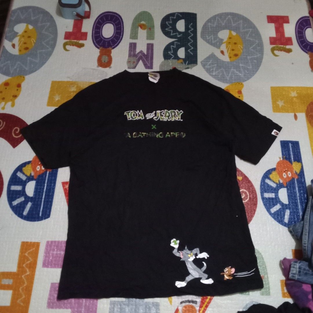 Bape x Tom and Jerry (Category: Formal Shirts) located in Manila. Submitted by tcbukay_zxc25 (Listing ID 1461951223, Image 1). Description: bape x Tom ad Jerry issue minimal hairline size xl no gold tag.