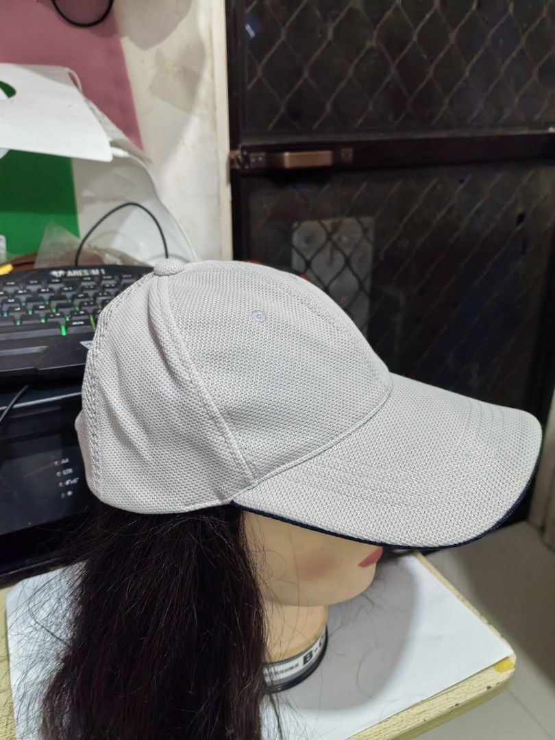 Baseball Cap (Category: Caps & Hats) located in Cebu City. Submitted by dudes_villanueva (Listing ID 1461816692, Image 3). Description: Baseball Cap 📌 It features a classic six-panel design with eyelet vents for breathability, reinforced stitching on the brim, and a dark navy contrast trim running along the edge of the visor 📌 This type of sports cap is constructed from lightweight, moisture-wicking waffle-mesh fabric, making it perfect for ath