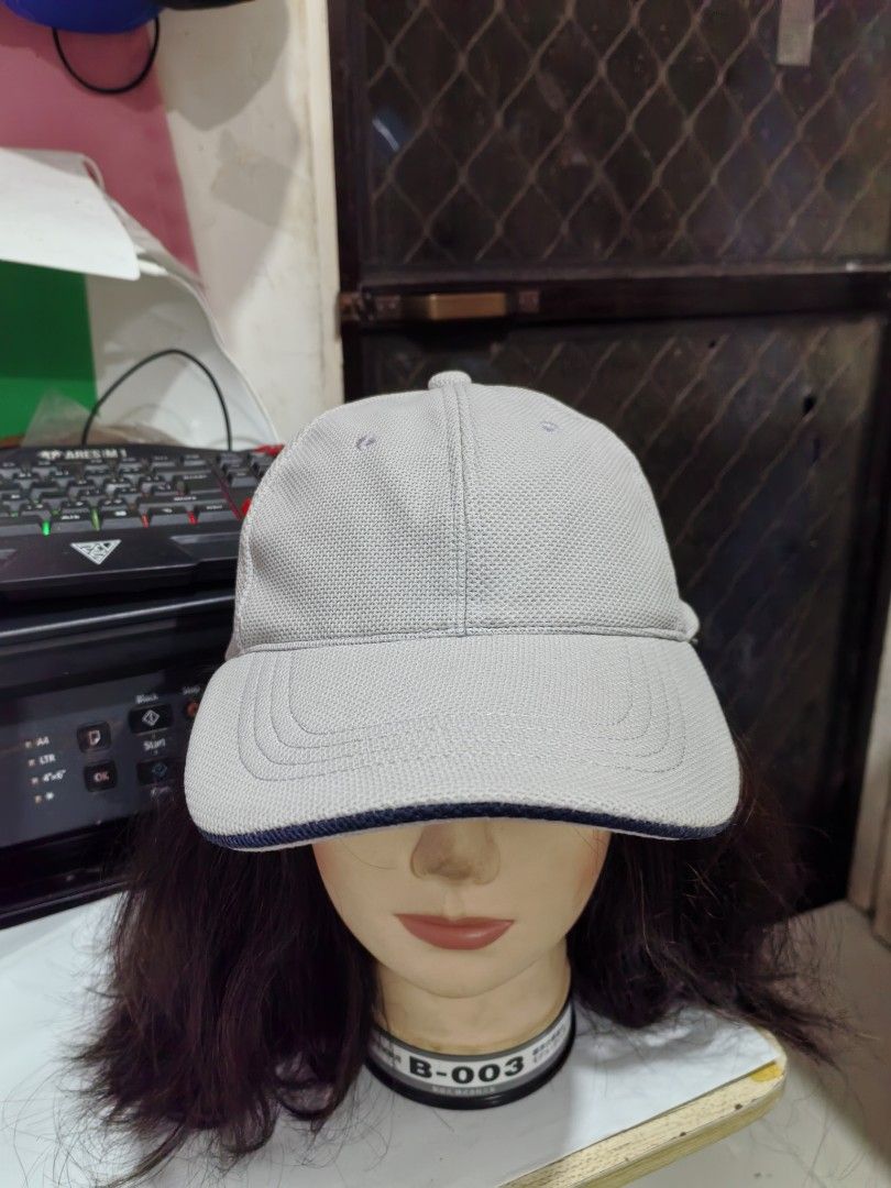 Baseball Cap (Category: Caps & Hats) located in Cebu City. Submitted by dudes_villanueva (Listing ID 1461816692, Image 2). Description: Baseball Cap 📌 It features a classic six-panel design with eyelet vents for breathability, reinforced stitching on the brim, and a dark navy contrast trim running along the edge of the visor 📌 This type of sports cap is constructed from lightweight, moisture-wicking waffle-mesh fabric, making it perfect for ath