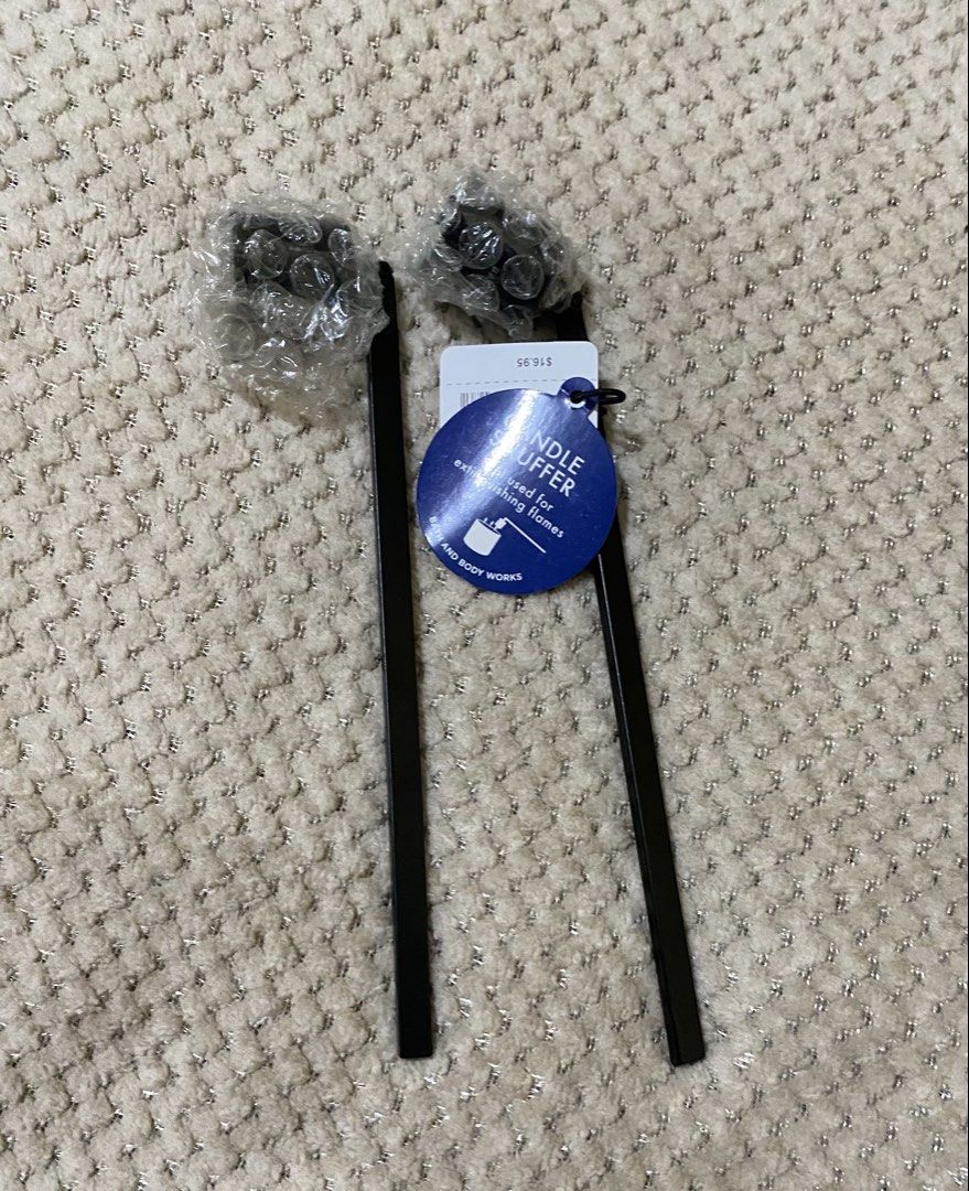 Bath & Body Works Candle Snuffer (Category: Home Improvement Tools & Accessories) located in Cavite. Submitted by momrocks (Listing ID 1461900423, Image 1). Description: black metal featuring a long, sleek handle and a classic bell-shaped extinguisher head. Explicitly designed for safely extinguishing candle flames without blowing melted wax or smoke everywhere. Here is how and why it is used: Primary Purposes Extinguishing Flames: You place the 
