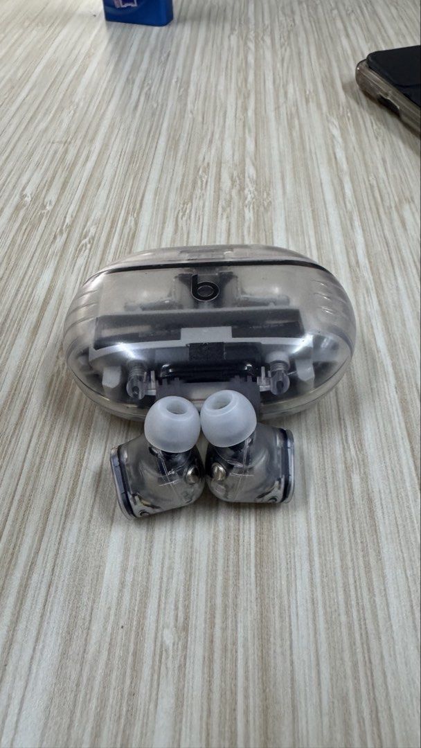 Beats Transparent Wireless Earbuds with Charging Case (Category: Earphones) located in Angeles City. Submitted by mooshi.942 (Listing ID 1461949688, Image 2). Description: - Transparent Beats earbuds - Includes charging case - Ear tips provided - Unique clear case design showcasing internals - Excellent sound quality - Simple and easy Bluetooth pairing - User-friendly operation.