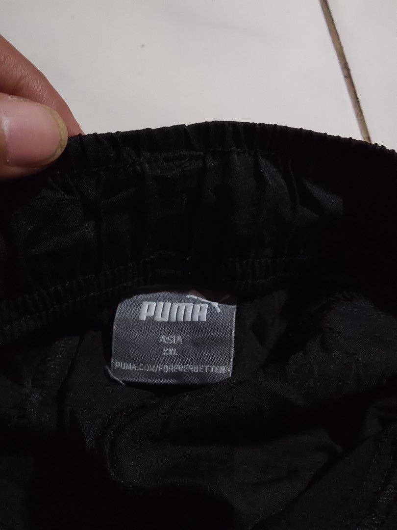 Big Logo Puma Shorts (Category: Shorts) located in Cavite. Submitted by ara.thrifts (Listing ID 1461814187, Image 3). Description: - Black Puma shorts - Size XXL width "17" length "21.5-22" no issue as new crispy pa 10/10 cr - Large white Puma logo on front - Elastic waistband with drawstring - Comfortable and durable material - Perfect for sports or casual wear.