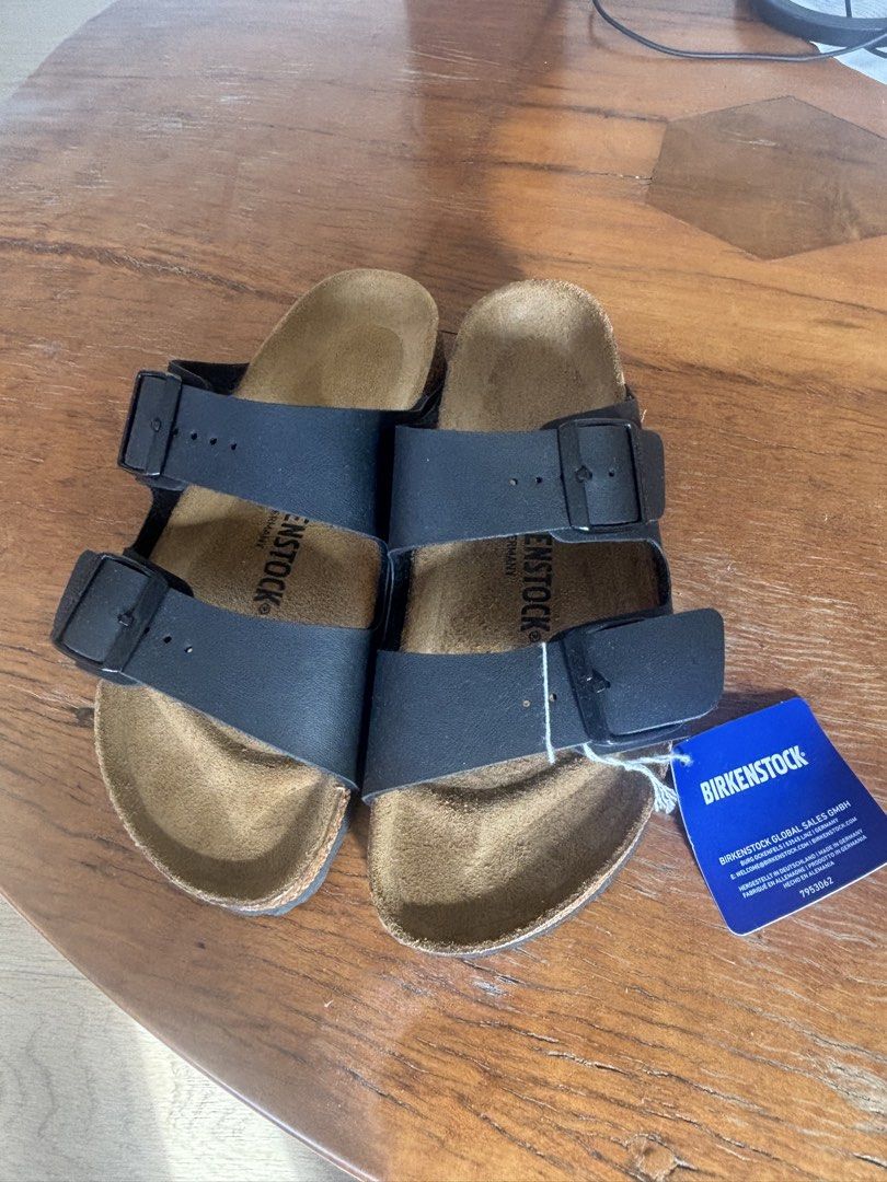 Birkenstock Leather Sandals Size 38 (Category: Flats & Sandals) located in Muntinlupa City. Submitted by highmee (Listing ID 1461943058, Image 1). Description: - Classic Birkenstock Arizona sandals - Comfortable cork footbed - Made in Germany - Size: 38 EU / 245mm - Ideal for everyday wear - Easy slip-on style -Brand new -Purchased in Dubai -Rfs too small for me.