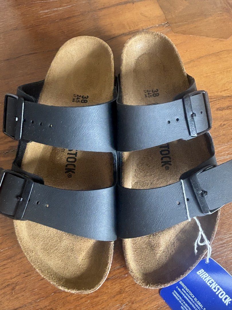 Birkenstock Leather Sandals Size 38 (Category: Flats & Sandals) located in Muntinlupa City. Submitted by highmee (Listing ID 1461943058, Image 2). Description: - Classic Birkenstock Arizona sandals - Comfortable cork footbed - Made in Germany - Size: 38 EU / 245mm - Ideal for everyday wear - Easy slip-on style -Brand new -Purchased in Dubai -Rfs too small for me.