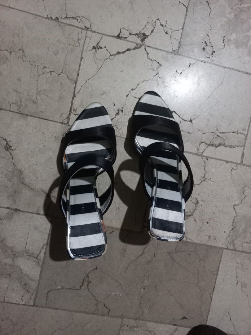 Black and White Striped Heeled Sandals (Category: Heels) located in Quezon City. Submitted by msdcshop (Listing ID 1461913405, Image 2). Description: - Stylish black and white striped heeled sandals - Open toe design - Two straps across the foot - Elegant stiletto heel - Ideal for dressing up your look.