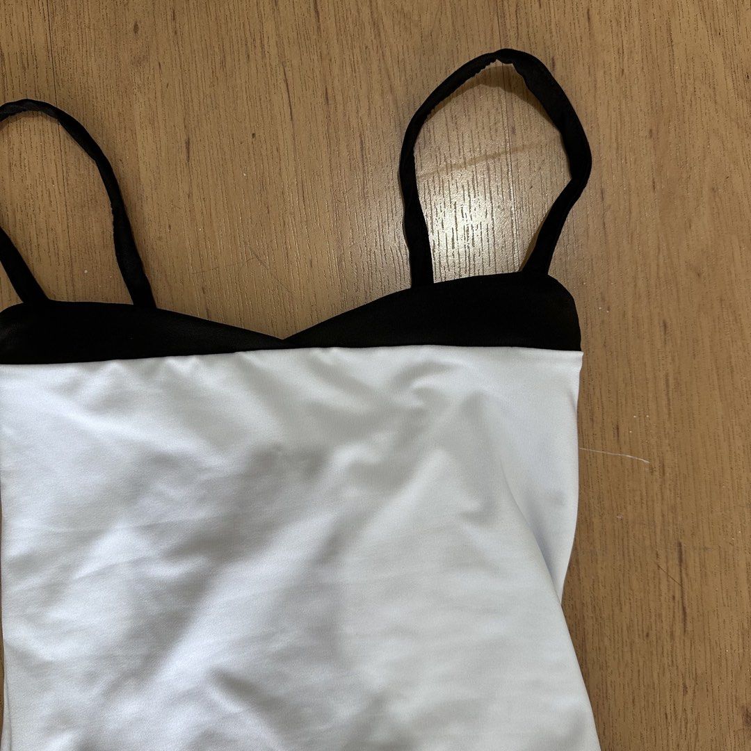 Black and White Tank Top (Category: Sleeveless) located in Cabuyao City. Submitted by hyugaclan (Listing ID 1461872662, Image 2). Description: .