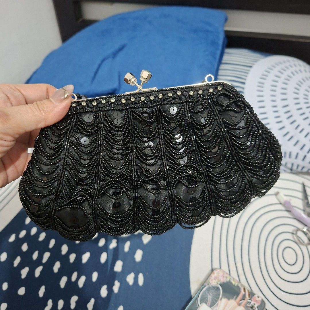 Black Beaded Clutch Bag with Chain Strap (Category: Clutches) located in Las Pinas. Submitted by jgz21 (Listing ID 1461857442, Image 2). Description: - Cute black beaded clutch bag - Scalloped design with sequins and beads - Comes with a delicate silver chain strap - Lined with black satin inside - Brand: Petit Maison - Ideal for parties and special occasions.