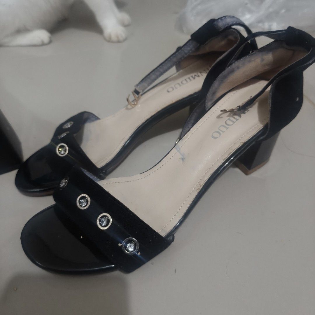 Black Block Heels with Ankle Strap (Category: Heels) located in Quezon City. Submitted by annethecoo17849 (Listing ID 1461896401, Image 1). Description: - Stylish black block heels - Secure ankle strap - Patent toe strap with decorative studs - Comfortable chunky block heel for easy walking - Perfect for dressing up or down cute black sandals.