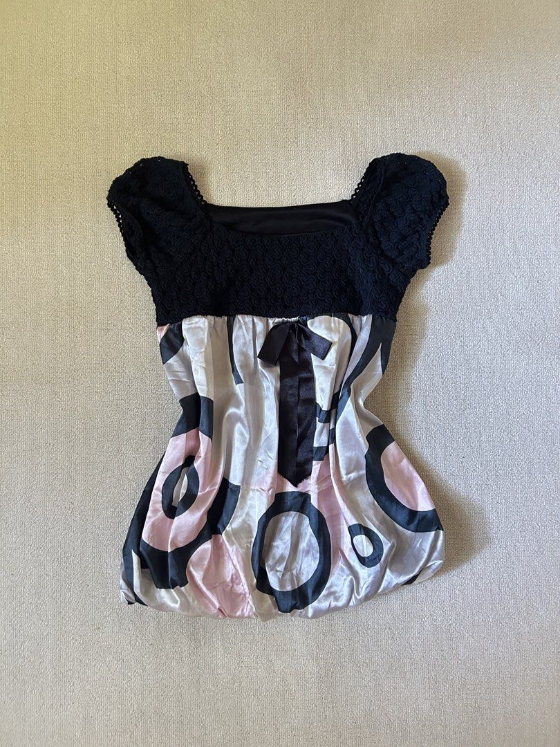 Retro Silk wrap top (Category: Blouses) located in Quezon City. Submitted by y2klar (Listing ID 1461996039, Image 1). Description: Black Blouse Silk top Medium 10/10 Condition no flaws..