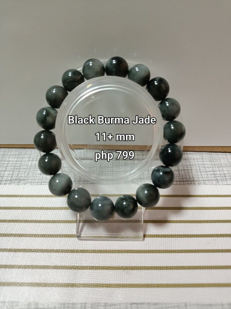 Black Burma Jade Bracelet 11+ mm (Category: Bracelets) located in Iloilo. Submitted by trinketsandtreasures.ph (Listing ID 1461848448, Image 1). Description: - Genuine Black Burma Jade bracelet - Bead size: 11mm and up - Ideal for everyday wear - Natural stone.