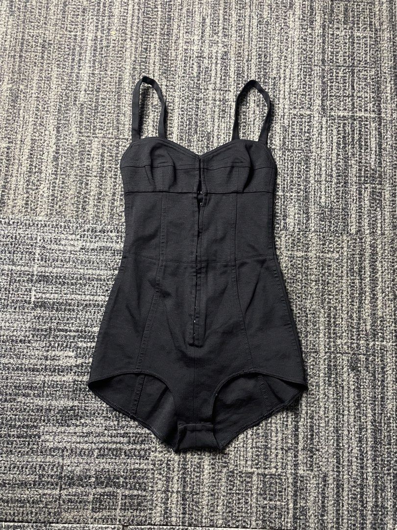 Black Corset Bodysuit with Hook and Eye Closure (Category: Undergarments & Loungewear) located in Taguig. Submitted by highlows (Listing ID 1461957207, Image 1). Description: size xs 11.5x24 flaw makikita sa last pic but still good condition 9/10.
