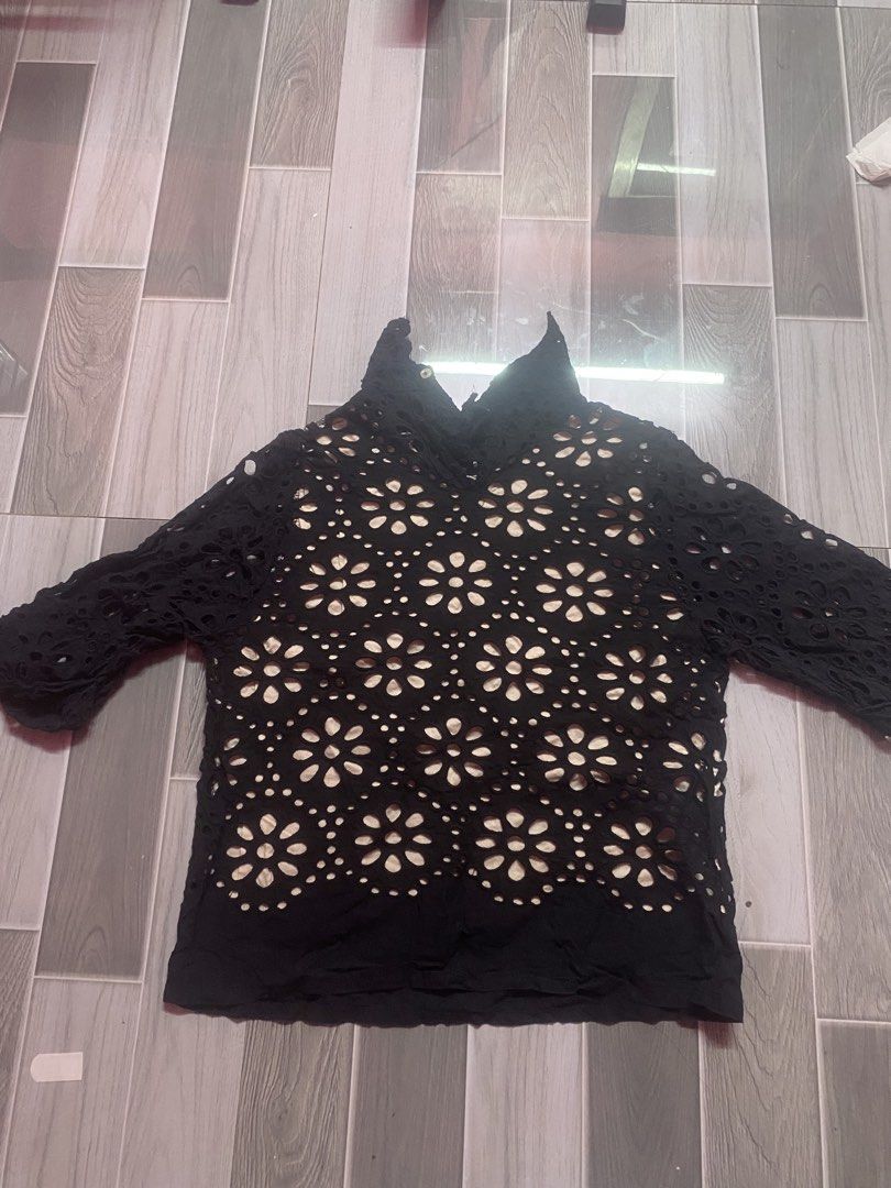 Black Eyelet Lace High-Neck Blouse (Category: Activewear) located in Manila. Submitted by kenthriftt (Listing ID 1461991696, Image 1). Description: Size Small Add a touch of vintage elegance to your wardrobe with this Black Eyelet Lace High-Neck Blouse! Featuring intricate floral cutouts (broderie anglaise) and a sophisticated mock-neck design, this top brings a romantic, boho-chic vibe to any outfit. It includes a soft inner lining on the torso 