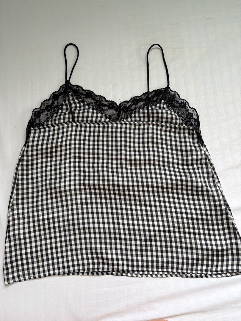 black gingham lace silk top (Category: Sleeveless) located in Bocaue. Submitted by cleodeclutters (Listing ID 1461820736, Image 3). Description: ☆ flowy material ☆ mop : gcash, maribank, bdo mod : j&t, lalamove message for more details & inquiries ➔ payment first ➔ strictly no return & refund.