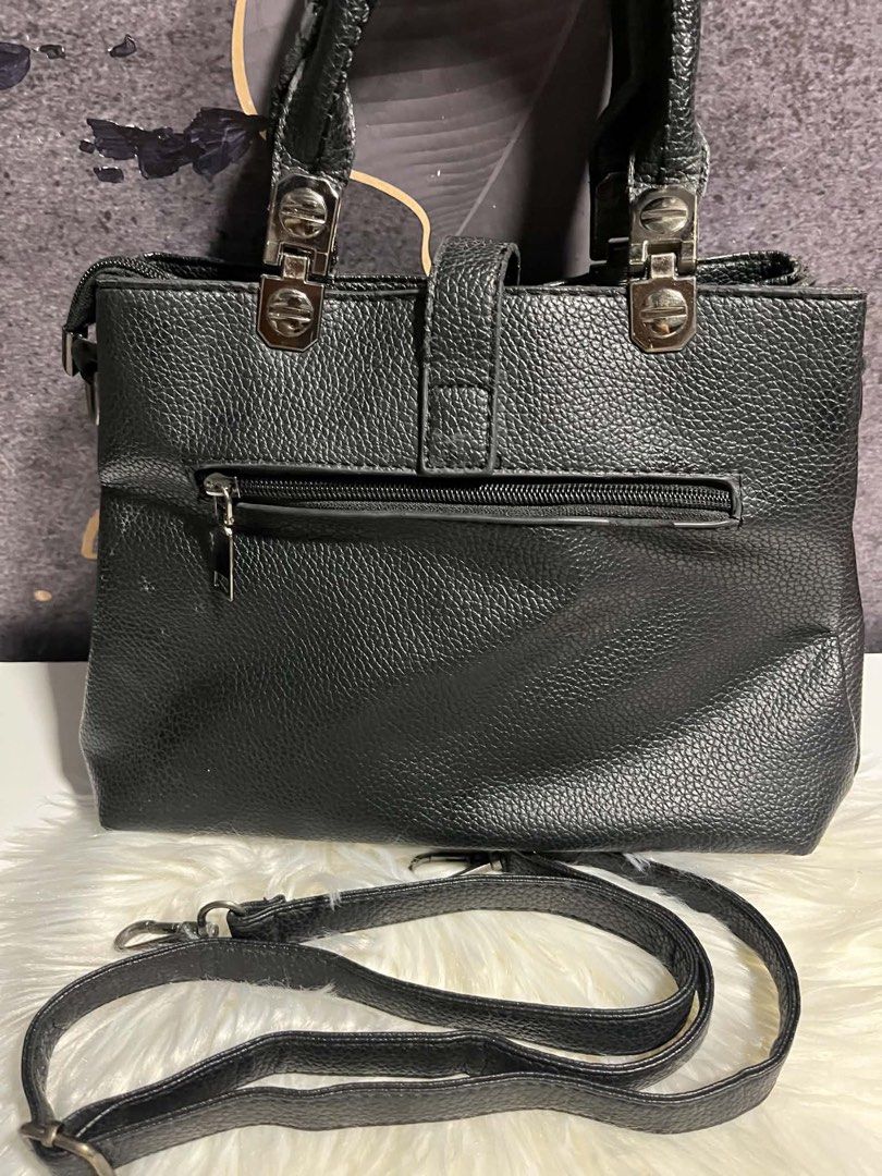 Black hand/sling bag (Category: Shoulder Bags) located in Caloocan City. Submitted by trebdy01 (Listing ID 1461827773, Image 3). Description: Preloved Good condition Actual photos posted.