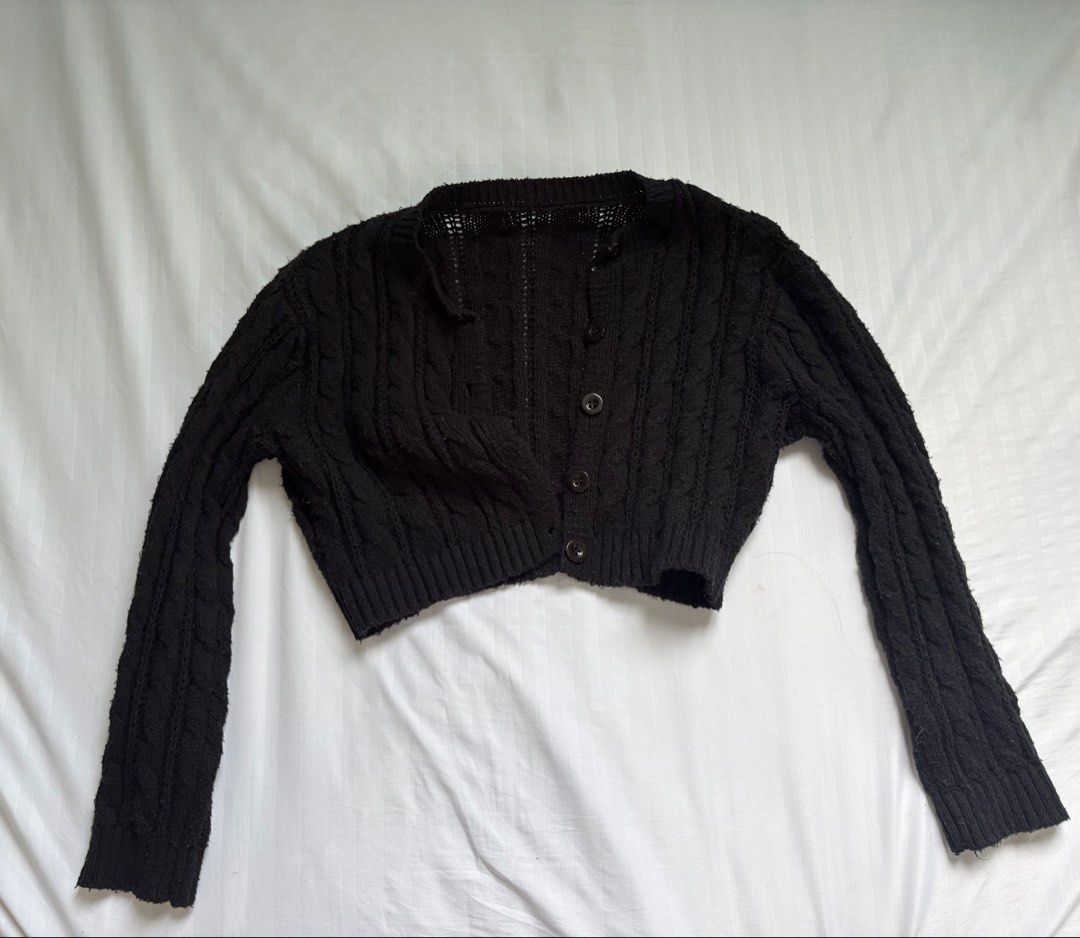 black knitted cropped cardigan (Category: Coats, Jackets and Outerwear) located in Bocaue. Submitted by cleodeclutters (Listing ID 1461820219, Image 1). Description: ☆ cropped and crochet-like ☆ mop : gcash, maribank, bdo mod : j&t, lalamove message for more details & inquiries ➔ payment first ➔ strictly no return & refund.