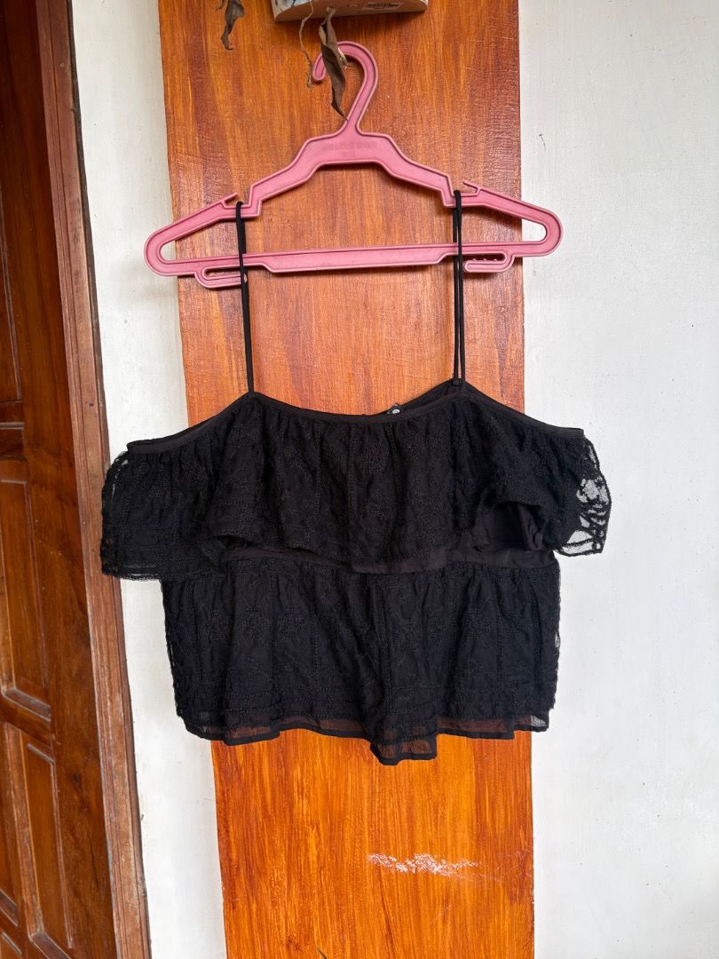 Black Lace Cold Shoulder Crop Top (Category: Others Tops) located in Daraga. Submitted by hannah.clo (Listing ID 1461853281, Image 1). Description: - Cute black lace crop top - Cold shoulder design with spaghetti straps - Ruffled layers for a flowing look - Ideal for night outs or special occasions - Pairs well with high-waisted bottoms.