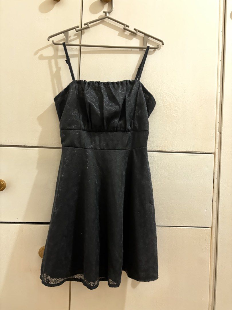 Black Lace Trimmed adjustable Spaghetti Strap Mini Dress (Category: Dresses) located in Subic. Submitted by kai000. (Listing ID 1461958177, Image 2). Description: - Black mini dress - Spaghetti straps - Ruched bust detail - Delicate lace trim at hem - Subtle textured fabric - Back zipper closure - Ideal for parties or a night out 📩Message if you have any questions 💲Gcash 🚚J&T 📌Olongapo, Zambales 👍Price is negotiable .