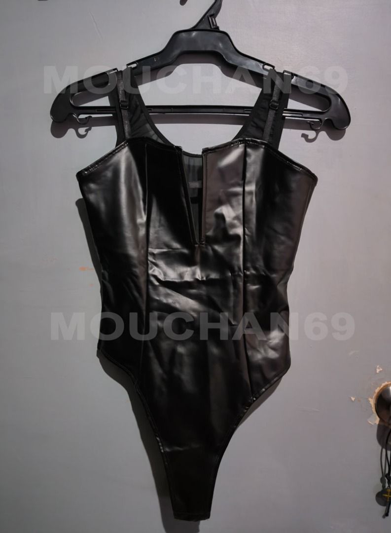 Black PU Leather V-Neck Bodysuit (Category: Others Tops) located in Pasig City. Submitted by Mou_chan (Listing ID 1461947423, Image 1). Description: Item Name: Black PU Leather V-Neck Bodysuit Brand: Off-brand Price: 300 Specifications: Size S. fabric is a bit stretchy. Condition: Used only once., includes an inner stocking >No when worn..