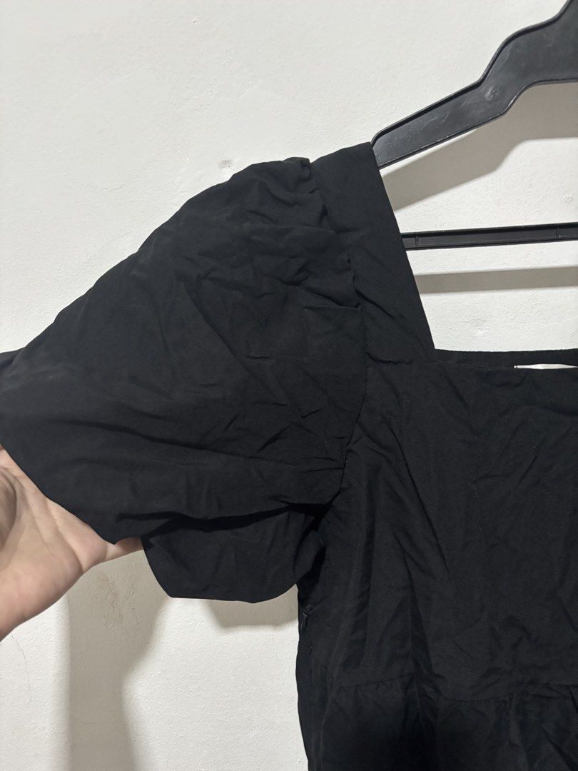 Black Puff Sleeve Square Neck Mini Dress (Category: Dresses) located in Paranaque City. Submitted by _itskendi (Listing ID 1461943769, Image 2). Description: - Black mini dress - Puff sleeves - Square neckline - Elasticated waist for a flattering fit - Side zipper closure - Crinkled fabric texture - Versatile for casual outings or dressing up.