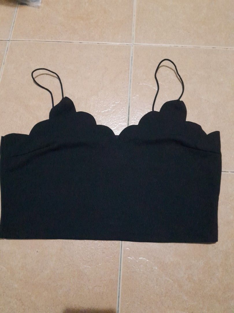 Black Scalloped Hem Cami Crop Top (Category: Sleeveless) located in Quezon City. Submitted by patricia19leones (Listing ID 1461914410, Image 2). Description: - Cute black cami crop top - Scalloped hem detail along the bust - Thin spaghetti straps - Versatile: pairs well with high-waisted jeans or skirts -Size : 0XL on tag.