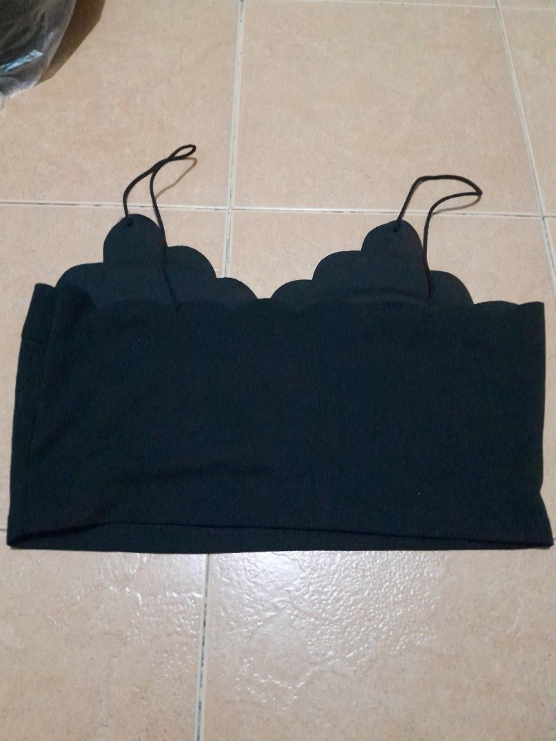 Black Scalloped Hem Cami Crop Top (Category: Sleeveless) located in Quezon City. Submitted by patricia19leones (Listing ID 1461914410, Image 3). Description: - Cute black cami crop top - Scalloped hem detail along the bust - Thin spaghetti straps - Versatile: pairs well with high-waisted jeans or skirts -Size : 0XL on tag.