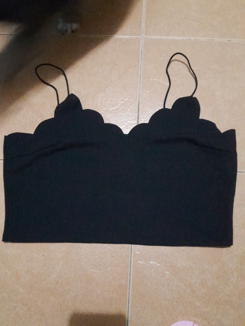 Black Scalloped Hem Cami Crop Top (Category: Sleeveless) located in Quezon City. Submitted by patricia19leones (Listing ID 1461914410, Image 1). Description: - Cute black cami crop top - Scalloped hem detail along the bust - Thin spaghetti straps - Versatile: pairs well with high-waisted jeans or skirts -Size : 0XL on tag.