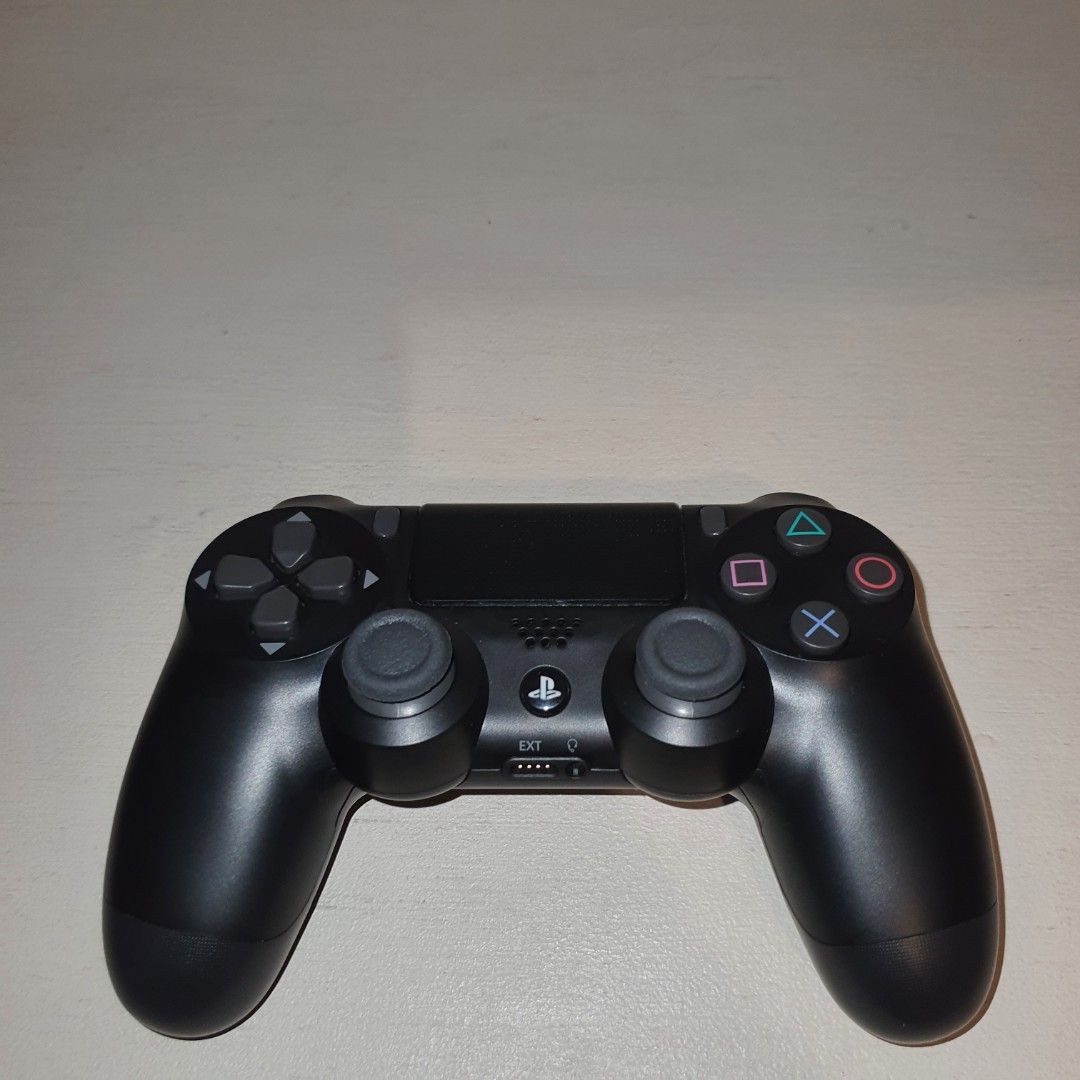 Black Sony PlayStation 4 DualShock 4 Controller (Category: Controllers) located in Pasig City. Submitted by mr.bargaindeal (Listing ID 1461798528, Image 2). Description: - Black Sony PlayStation 4 DualShock 4 Controller - Fully functional: All buttons and joysticks are responsive - Perfect for your next gaming session.