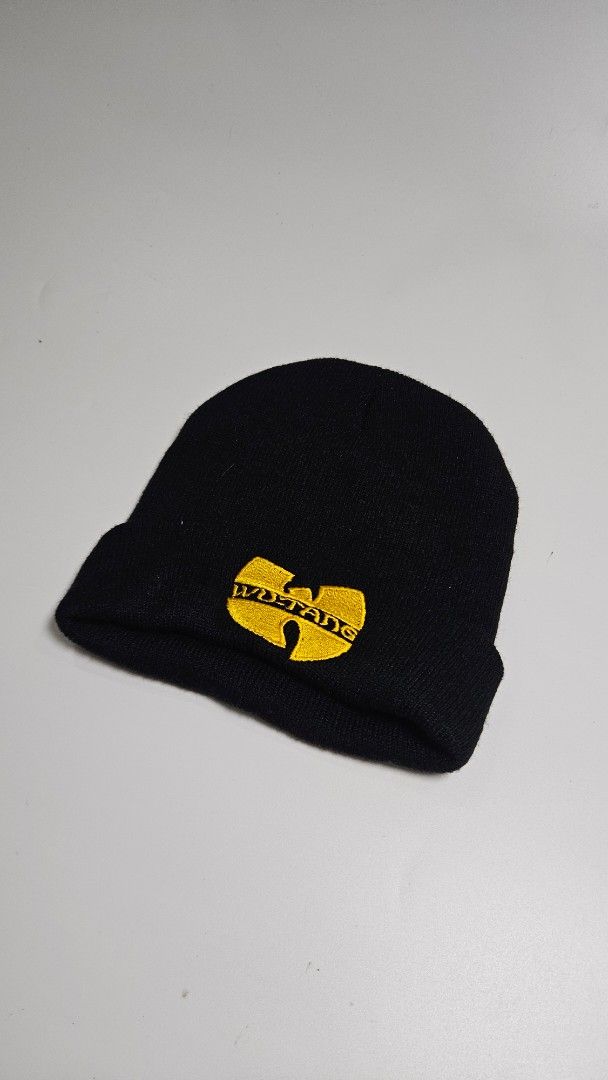 Black Wu-Tang Clan Beanie Hat (Category: Caps & Hats) located in Alfonso. Submitted by jbcamet (Listing ID 1461933878, Image 3). Description: - Classic black beanie - Iconic yellow Wu-Tang Clan logo embroidery - Comfortable knit material - One size fits most head sizes - Perfect for Wu-Tang fans - Keeps you warm in style.