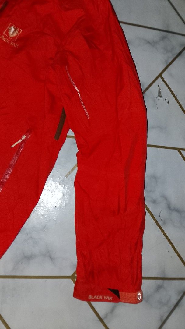 Black Yak Gore-Tex Red Outdoor Jacket (Category: Coats, Jackets and Outerwear) located in Rizal. Submitted by akosilelouh71119 (Listing ID 1461827025, Image 3). Description: -oranges Black Yak outdoor jacket - Waterproof and breathable Gore-Tex material - Multiple zippered pockets for storage - Hooded design for extra protection - Perfect for hiking and outdoor adventures withinimal lint's 25/29 dimes .