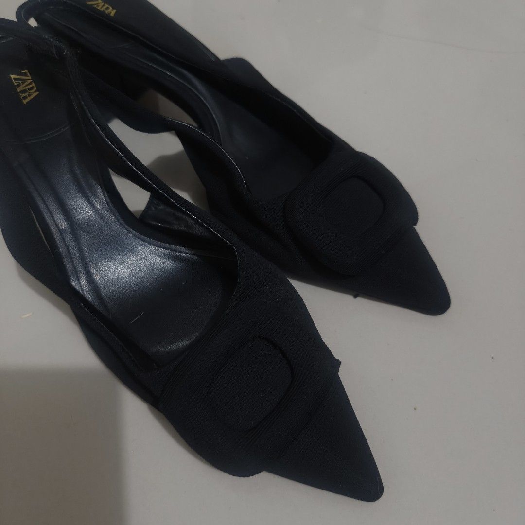 Black Zara Shoes Size 37 (Category: Flats & Sandals) located in Quezon City. Submitted by annethecoo17849 (Listing ID 1461895794, Image 2). Description: - Brand: Zara - Color: Black - Size: EU 37 (UK 4 / US 6) - Style: Slingback Heels - Features: Pointed toe, decorative buckle detail - Condition: Excellent (as pictured) barely used, has minor issue such as the fabric needs to be taped .