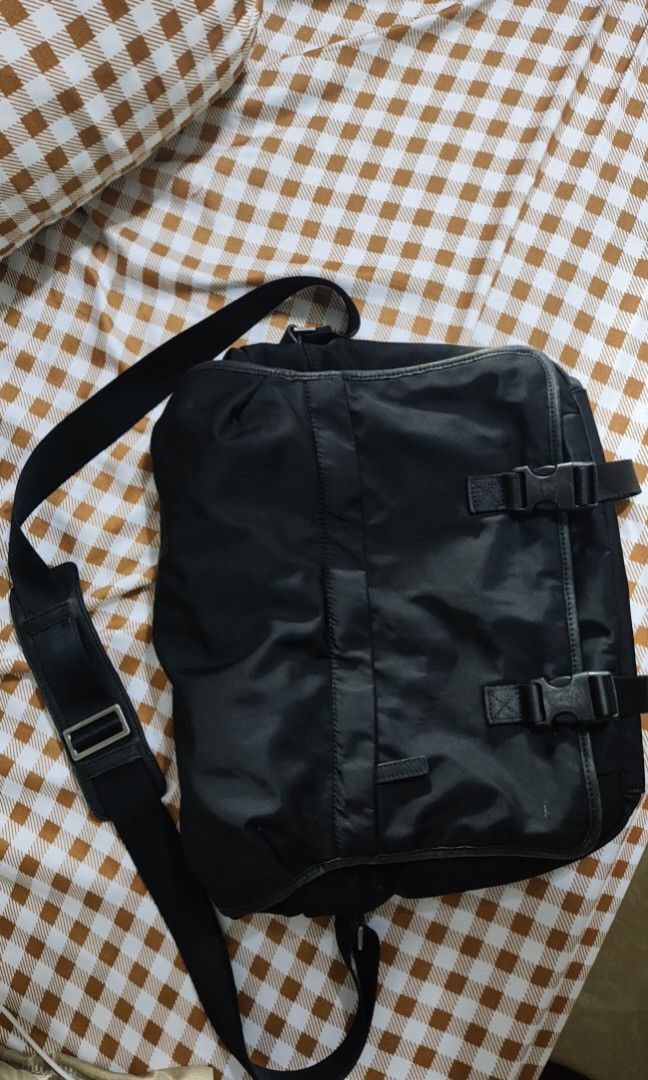 Blackbarret - Messenger Bag (Category: Sling Bags) located in Manila. Submitted by highaltitude (Listing ID 1461812212, Image 1). Description: FOR SALE: BLACKBARRETT Messenger Bag Brand: BLACKBARRETT Color: Black Material: Nylon with leather trim Size: Large - fits laptop, documents Features: - Main compartment with drawstring - Front flap with 2 buckle closures - Inside zip pocket - Adjustable shoulder strap with leather shoulder pad Condition: 