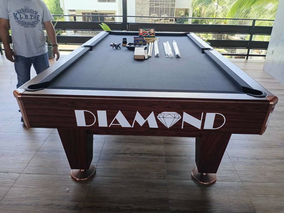 Blakk Diamond 8 Billiard Table ! (Category: Billiards and Bowling) located in Iloilo. Submitted by maling13 (Listing ID 1461856773, Image 2). Description: - Blakk Diamond 8 Billiard Table - Classic and elegant wood finish - Features the iconic Diamond branding - Suitable for home game rooms or commercial use - Ready for immediate play.