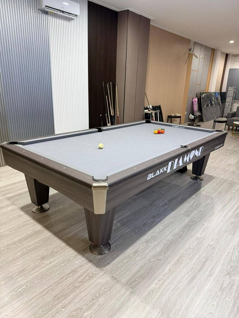 Blakk Diamond 8 Billiard Table ! (Category: Billiards and Bowling) located in Iloilo. Submitted by maling13 (Listing ID 1461856773, Image 1). Description: - Blakk Diamond 8 Billiard Table - Classic and elegant wood finish - Features the iconic Diamond branding - Suitable for home game rooms or commercial use - Ready for immediate play.