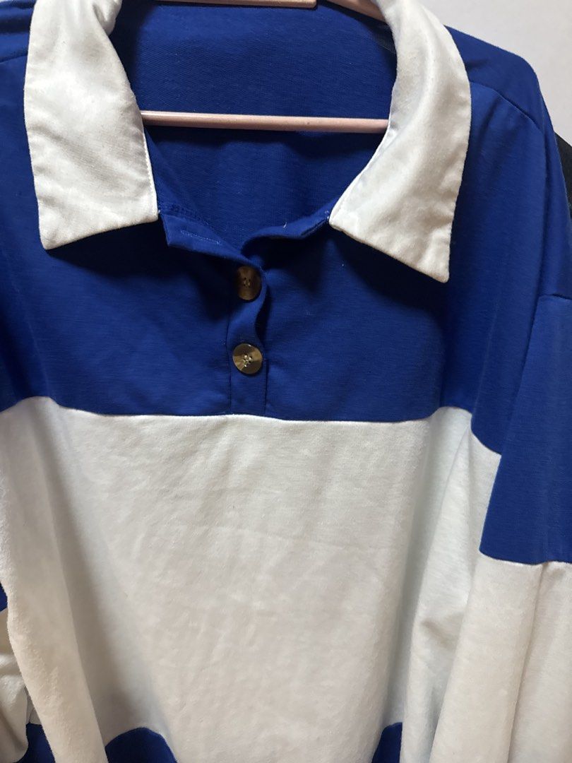 Blue and White Striped Long Collared Longsleeve (Category: Coats, Jackets and Outerwear) located in Manila. Submitted by quintessesommerset (Listing ID 1461822090, Image 3). Description: - Casual long sleeve shirt, 24x28 - Stylish blue and white color block design - Features a crisp white collar - Button details at the neck - Comfortable ribbed cuffs and hem - Ideal for everyday wear - Easily pairs with jeans or shorts.