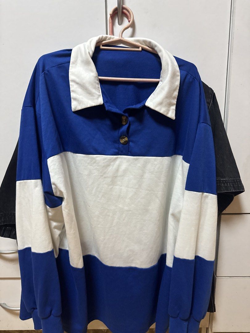 Blue and White Striped Long Collared Longsleeve (Category: Coats, Jackets and Outerwear) located in Manila. Submitted by quintessesommerset (Listing ID 1461822090, Image 2). Description: - Casual long sleeve shirt, 24x28 - Stylish blue and white color block design - Features a crisp white collar - Button details at the neck - Comfortable ribbed cuffs and hem - Ideal for everyday wear - Easily pairs with jeans or shorts.