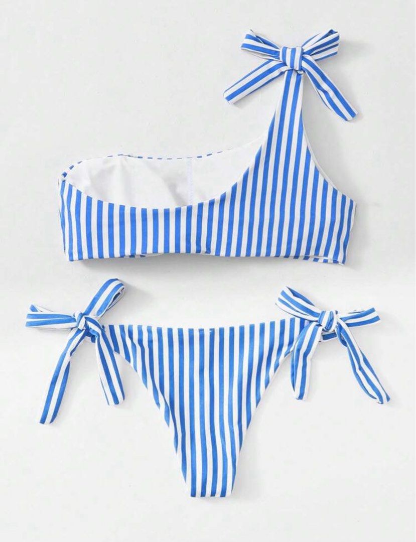 Blue and White Striped One-Shoulder Bikini (Category: Bikinis & Swimsuits) located in Muntinlupa City. Submitted by szamiee25 (Listing ID 1462000486, Image 2). Description: DM for more pictures and videos; Washed thoroughly + with warm water Selling Price: ₱250 📍Loc: Camella 1 🧚‍♀️ Shipping thru Lalamove for nearby areas or J&T ⭐️ MOD: Gcash, Maya, Bank Transfer or COD 🎀All items negotiable Items are preloved, and well taken 💗.
