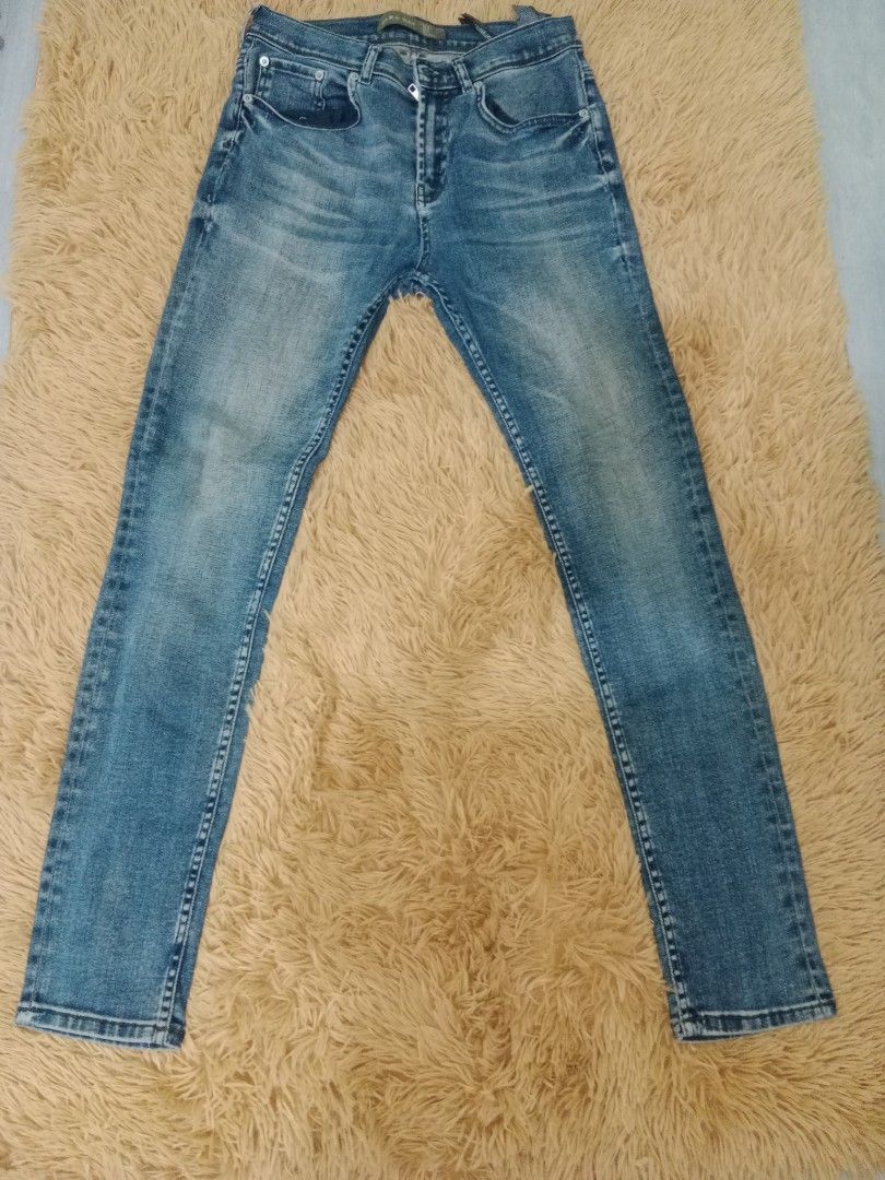 Blue Denim Jeans (Category: Jeans) located in Manila. Submitted by crazyjhoyz (Listing ID 1461861550, Image 1). Description: - Classic blue denim jeans - Straight leg fit - Button fly closure - Two front pockets - Two back pockets - Slight fading on thighs and knees for a worn-in look - Versatile for casual outfits.