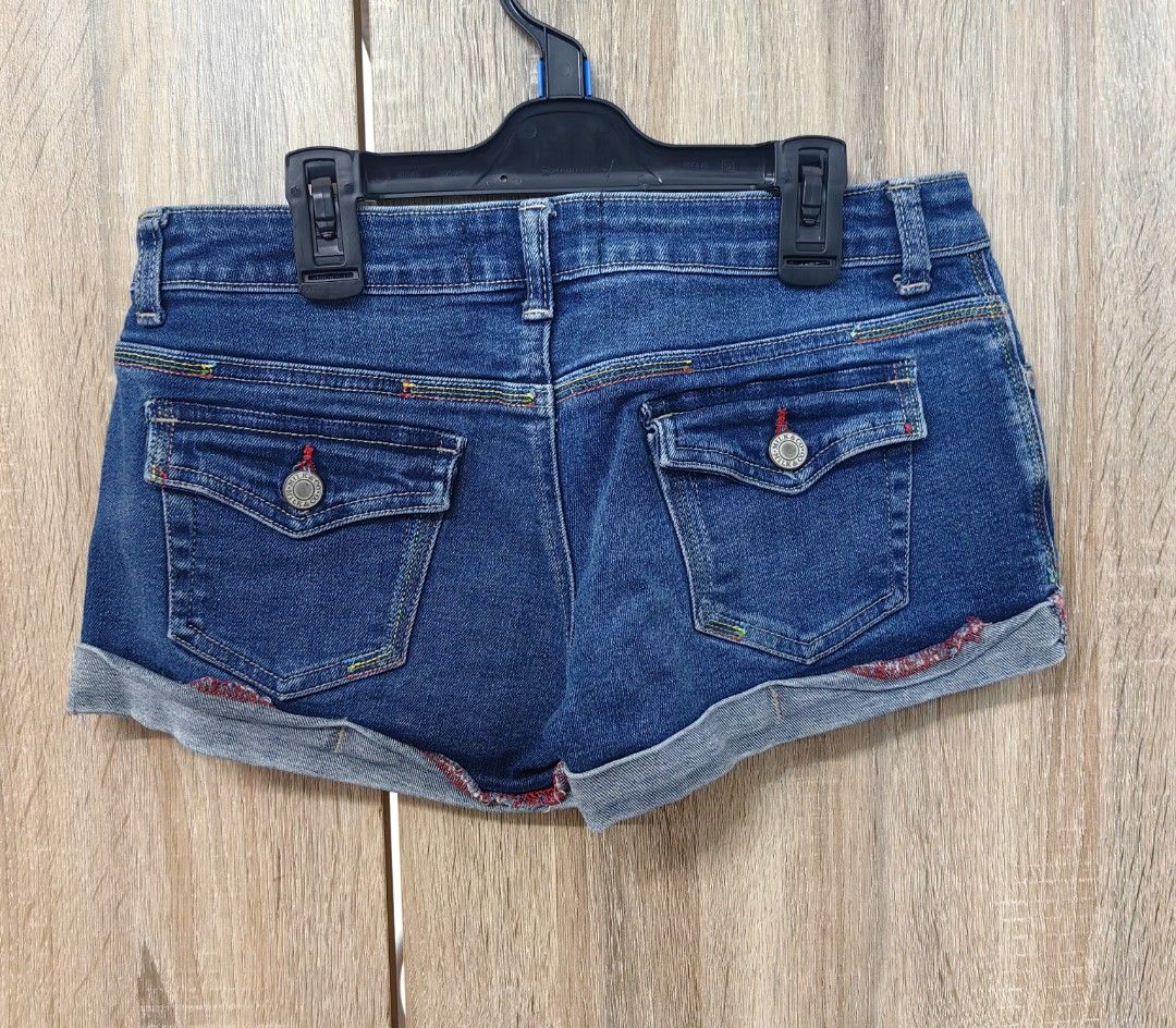 Blue Denim Shorts with Colorful Stitching (Category: Shorts) located in Las Pinas. Submitted by offtonewhome (Listing ID 1461801535, Image 2). Description: - Cute blue denim shorts - Features colorful stitching details on pockets and hem - Cuffed hem design - Great for casual wear - Measurements: Waist approx 14 inches, Length approx 9 inches.
