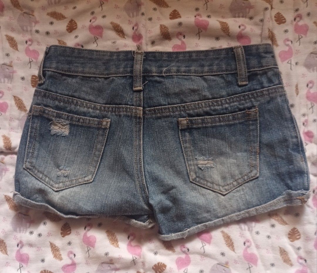 Blue Distressed Denim Shorts (Category: Shorts) located in Pasig City. Submitted by zeallion_149f0e (Listing ID 1461868651, Image 2). Description: - Cute blue denim shorts - Distressed details on front and back pockets - Cuffed hem - Ideal for casual wear - Effortlessly pairs with any top.