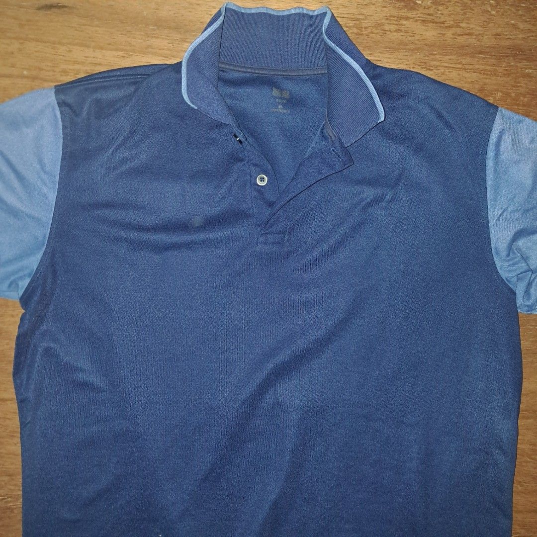 Blue Polo Shirt (Category: Tshirts & Polo Shirts ) located in Manila. Submitted by shaqal1bno (Listing ID 1461847383, Image 1). Description: - Classic blue polo shirt - Two-button placket - Contrasting light blue trim on collar and sleeves - Comfortable fabric - Great for casual wear or sports.