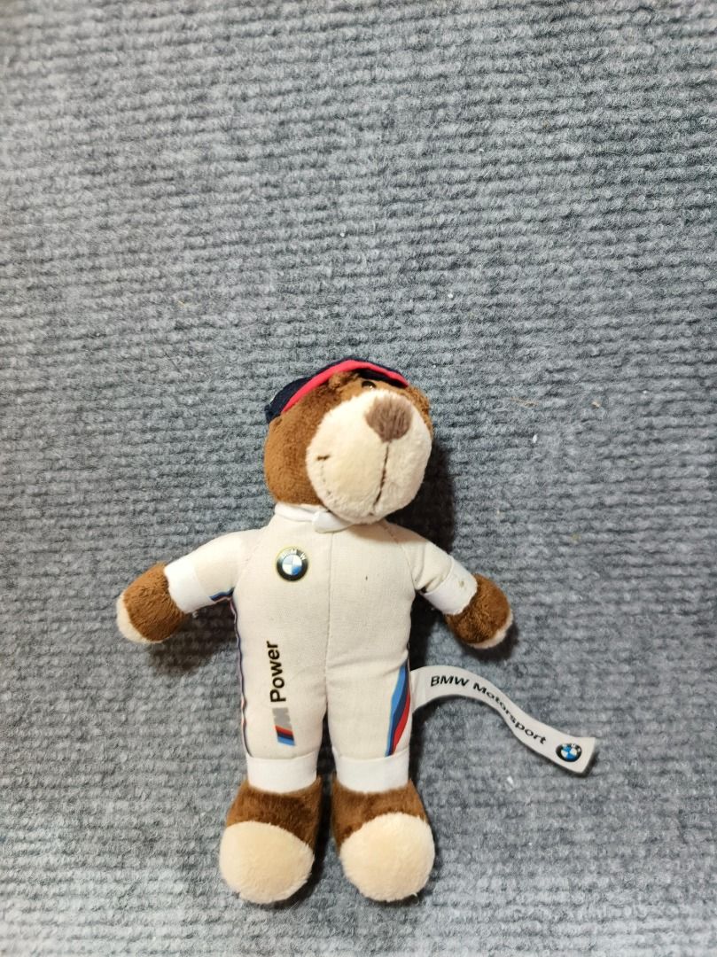BMW Mascot Key chain doll (Category: Plushies & Soft Toys) located in San Leonardo. Submitted by burgossanleonardo.12345 (Listing ID 1461809988, Image 2). Description: - Adorable BMW Motorsport teddy bear plush toy. - Features a cool racing suit outfit. - Comes with a convenient keychain attachment. - Approximately 4-5 inches in size. - Ideal for BMW enthusiasts and collectors. - Perfect for decorating bags or keys..
